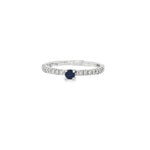 White gold ring with blue centre sapphire and round diamond shoulders