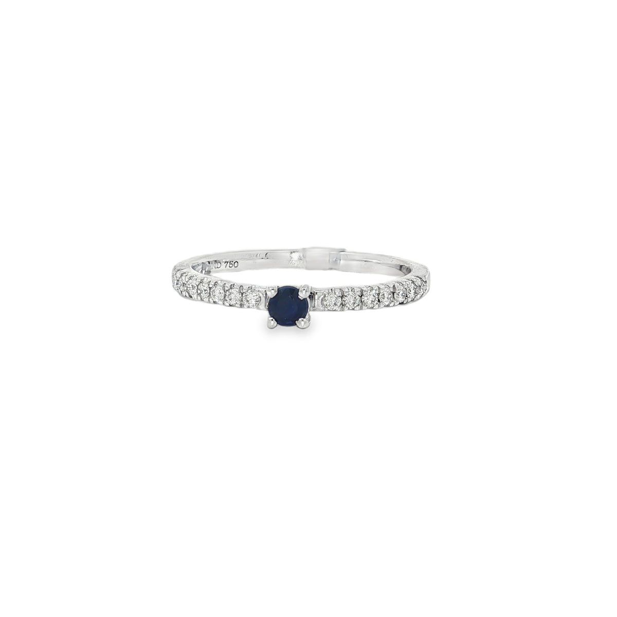 White gold ring with blue centre sapphire and round diamond shoulders