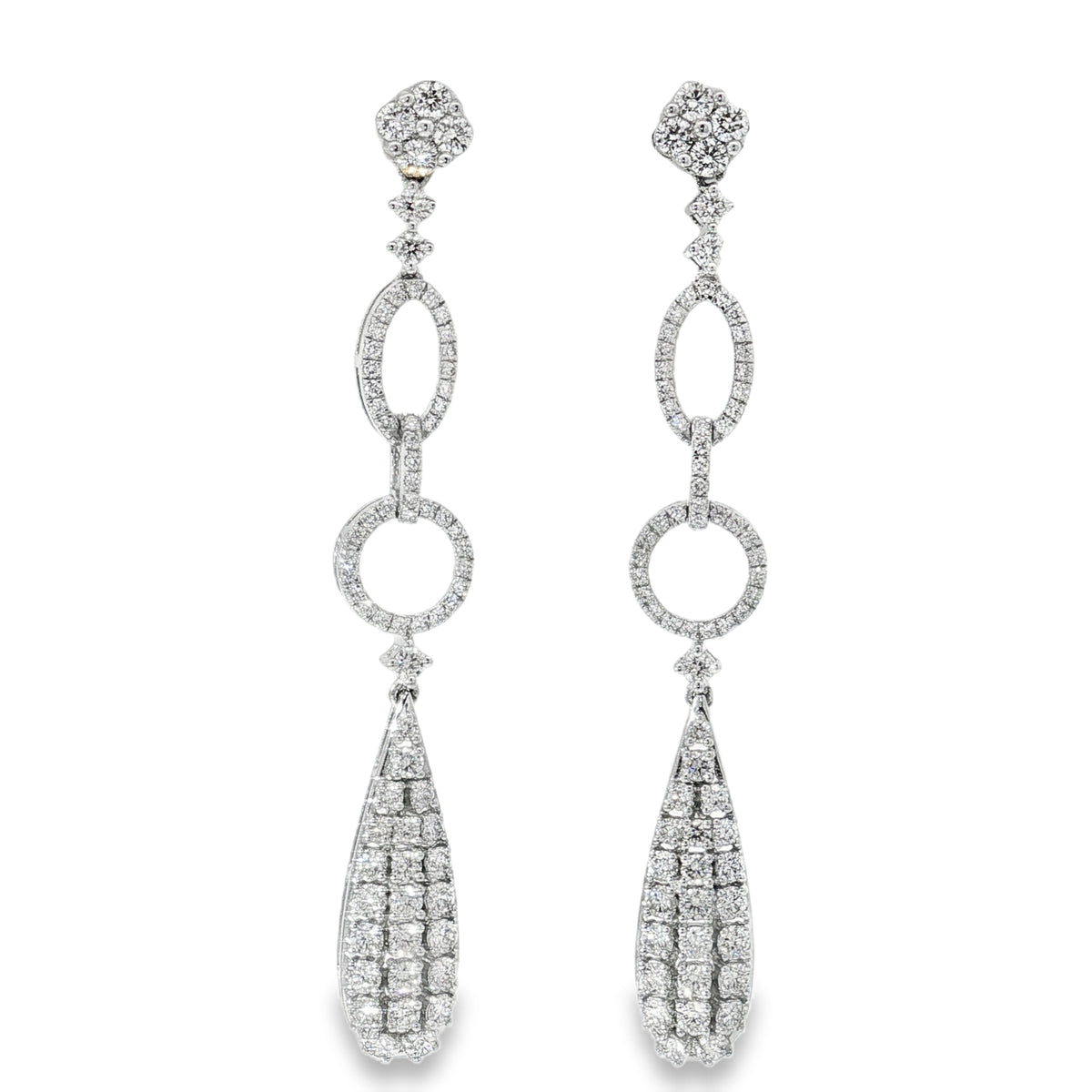 White gold diamond dangle earrings with oval links, circles and elongated teardrops