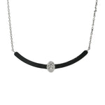 White gold necklace with black curved bar and central oval diamond cluster
