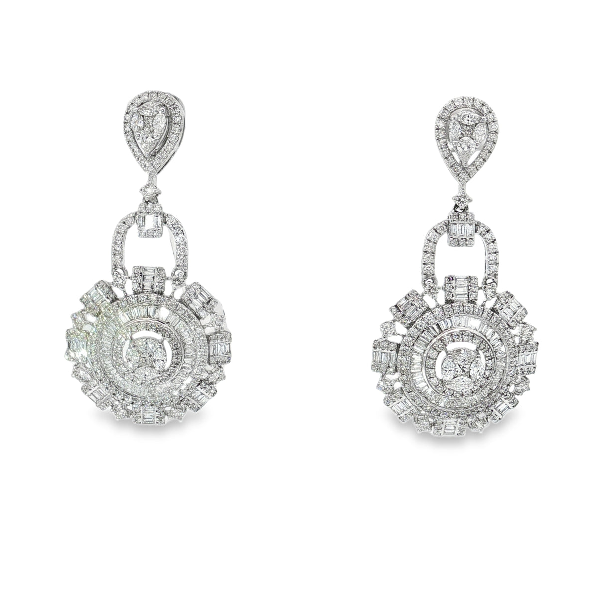 White gold diamond dangle earrings with pear-shaped tops and layered sunburst discs