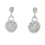 White gold diamond dangle earrings with pear-shaped tops and layered sunburst discs