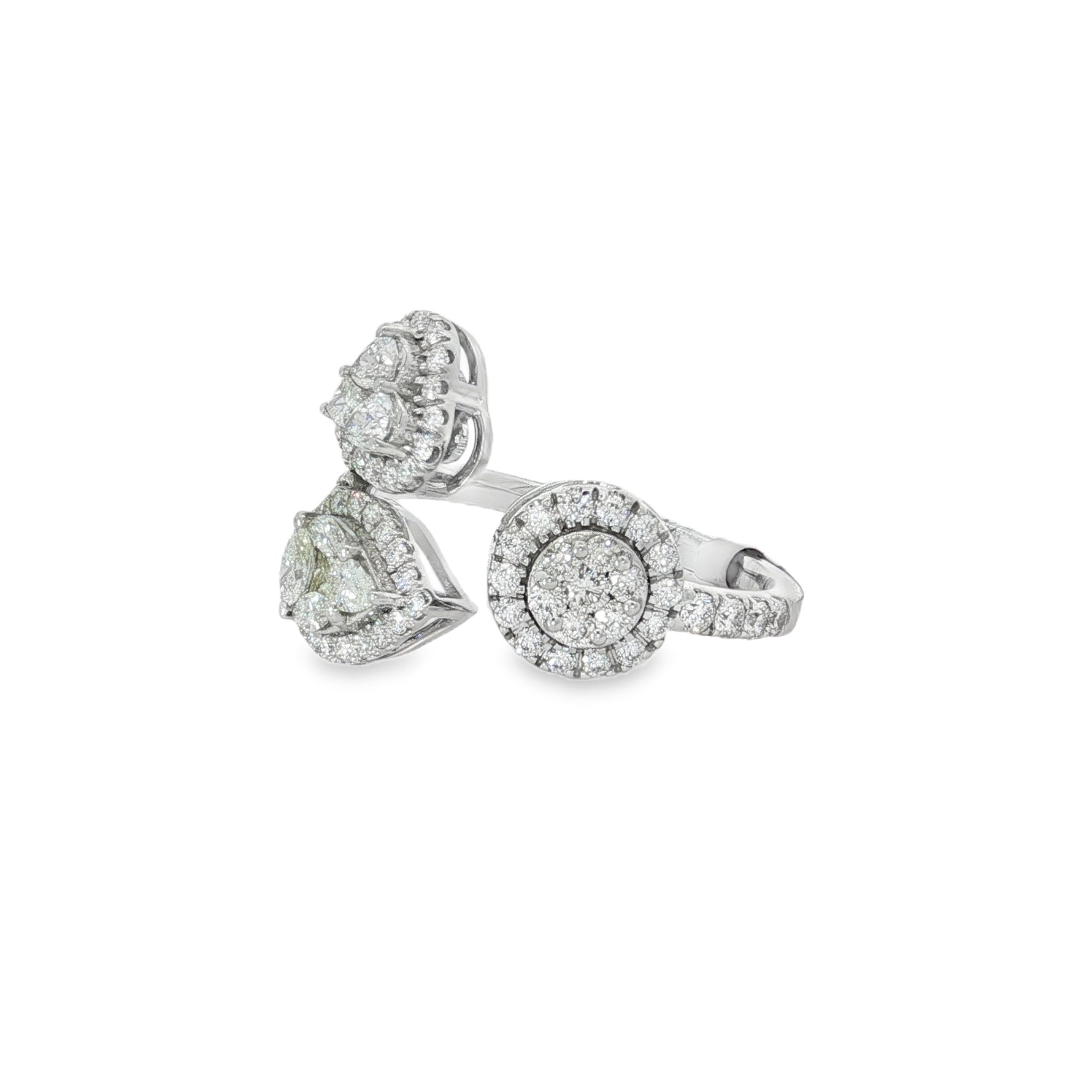 Side view showing pear and round diamond clusters on open ring