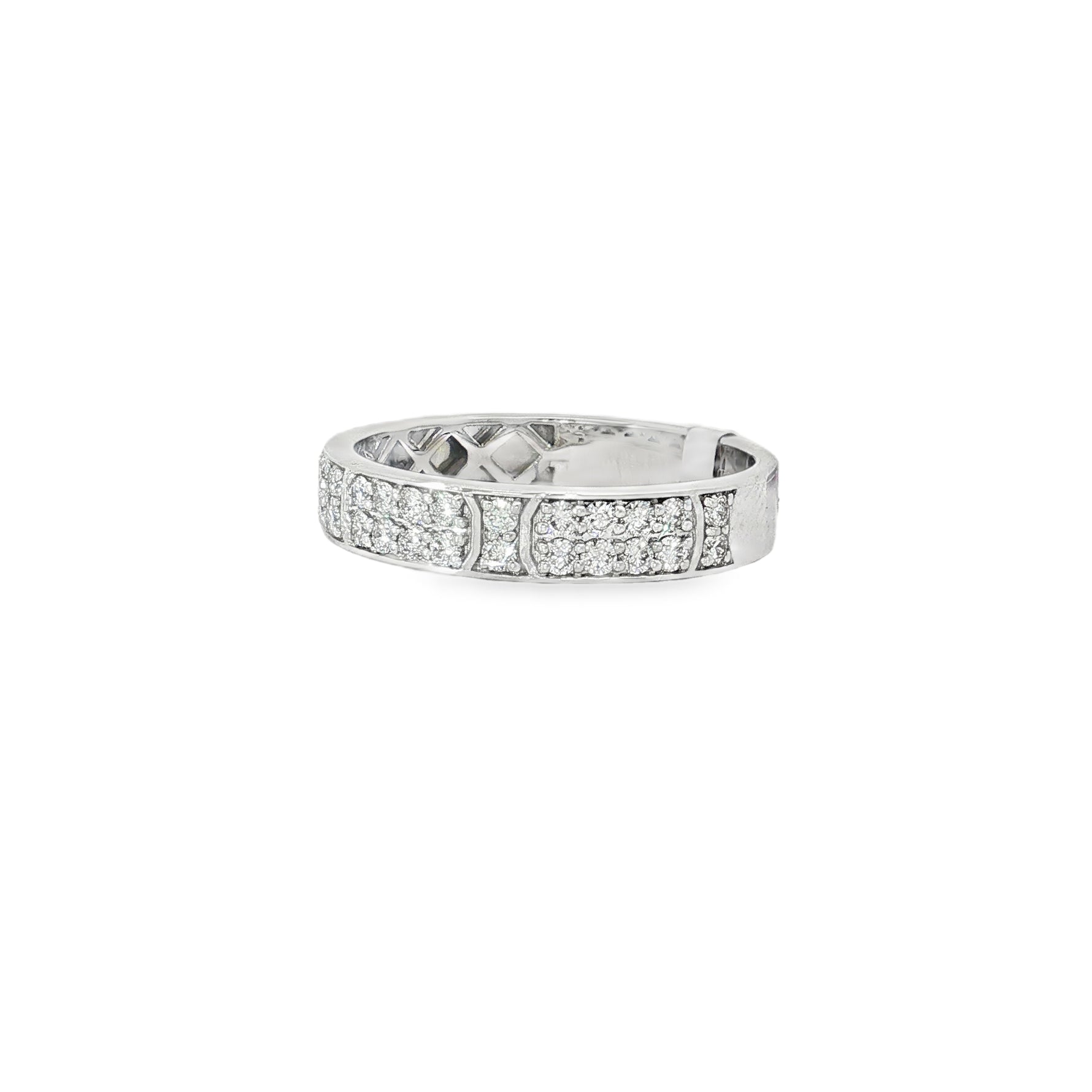 Angled view showing geometric panels and round diamond settings