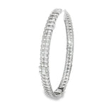 Side view showing hinged white gold bangle and diamond rows
