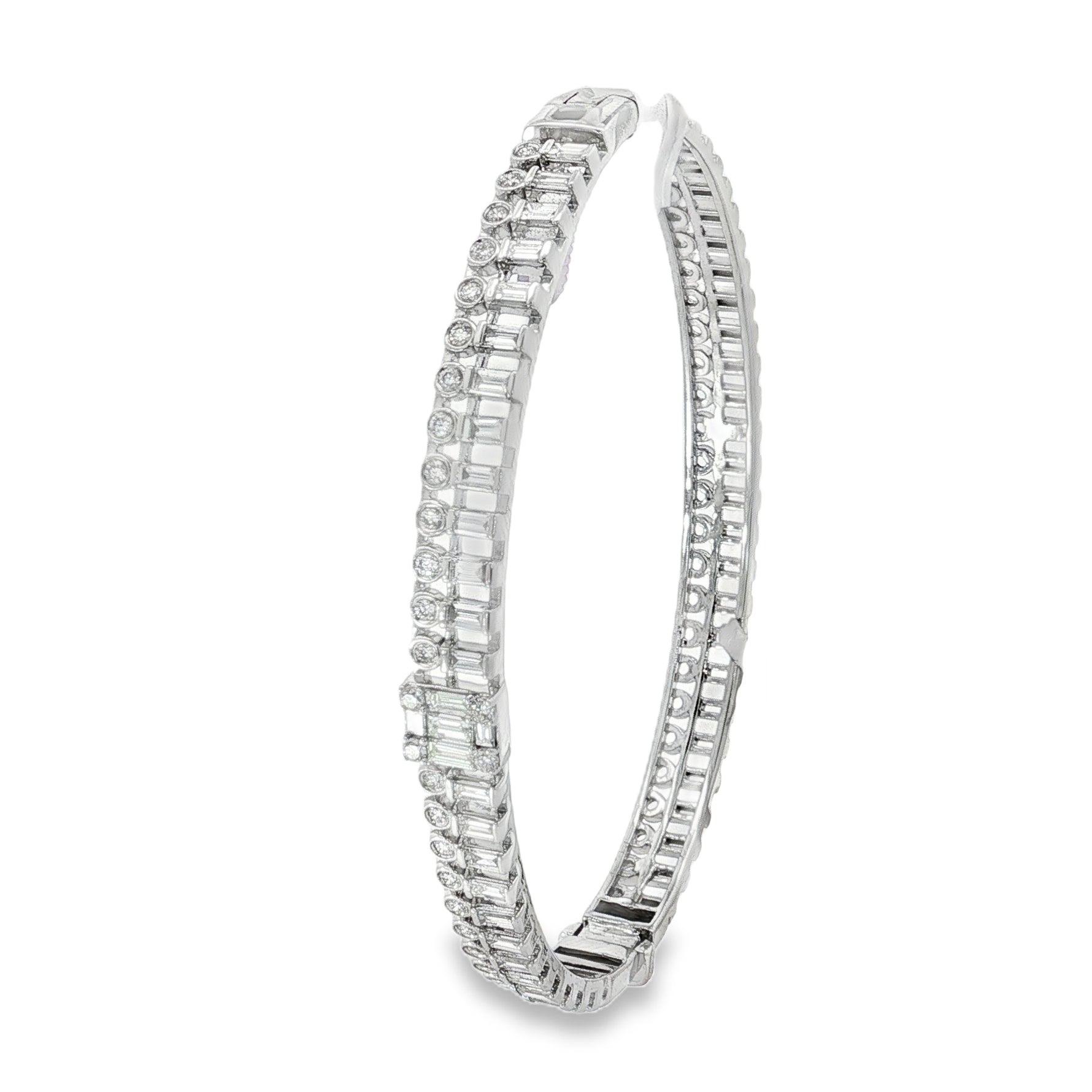 Side view showing hinged white gold bangle and diamond rows
