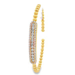 Side view of yellow gold beads and bordered diamond station
