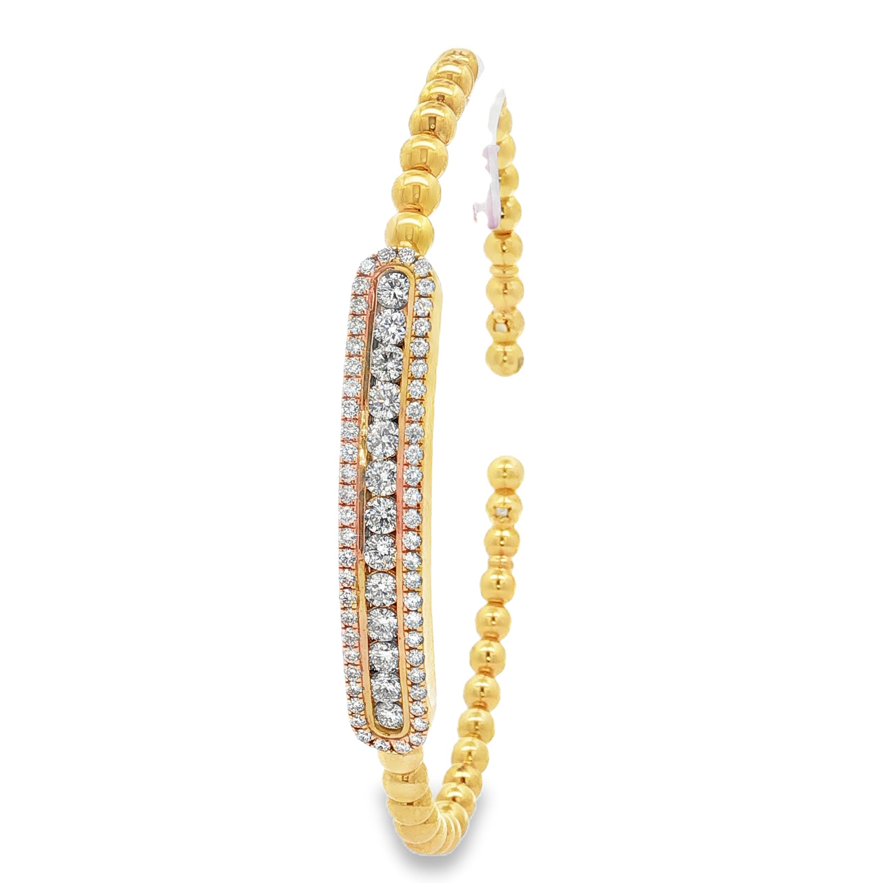 Side view of yellow gold beads and bordered diamond station