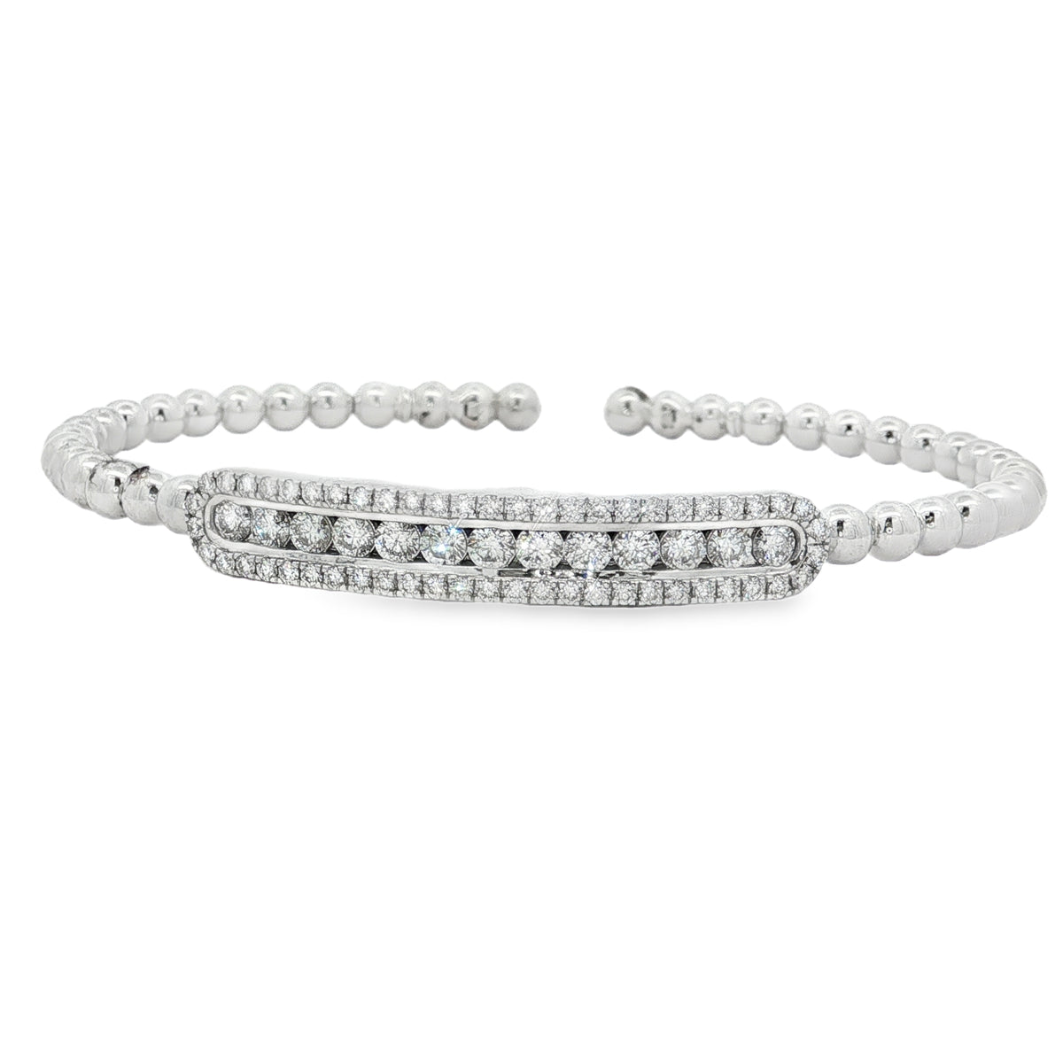 White gold beaded bangle with elongated round diamond station