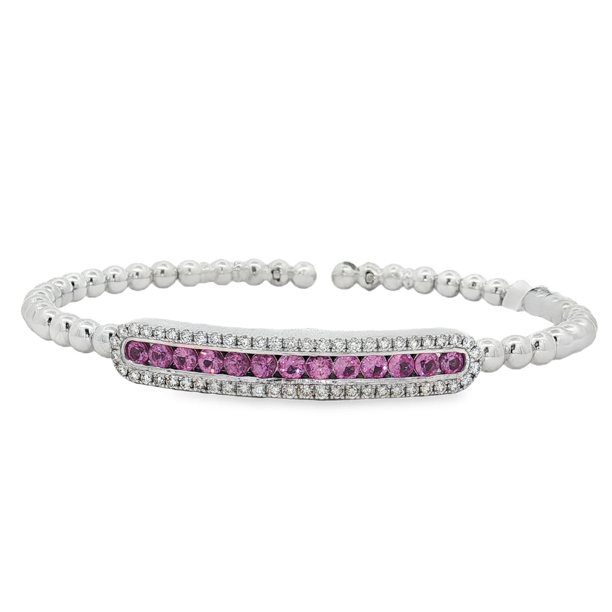 White gold beaded bangle with pink sapphire and diamond station