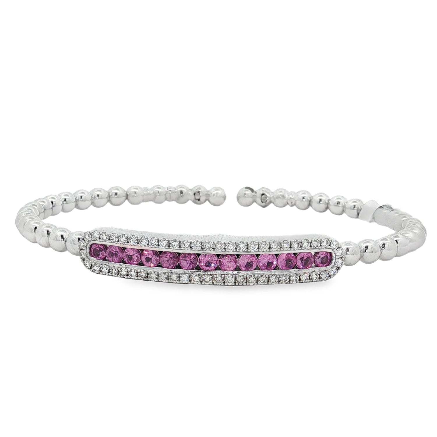 White gold beaded bangle with pink sapphire and diamond station