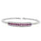 White gold beaded bangle with pink sapphire and diamond station