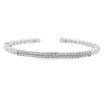 White gold beaded bangle with slender pavé diamond station