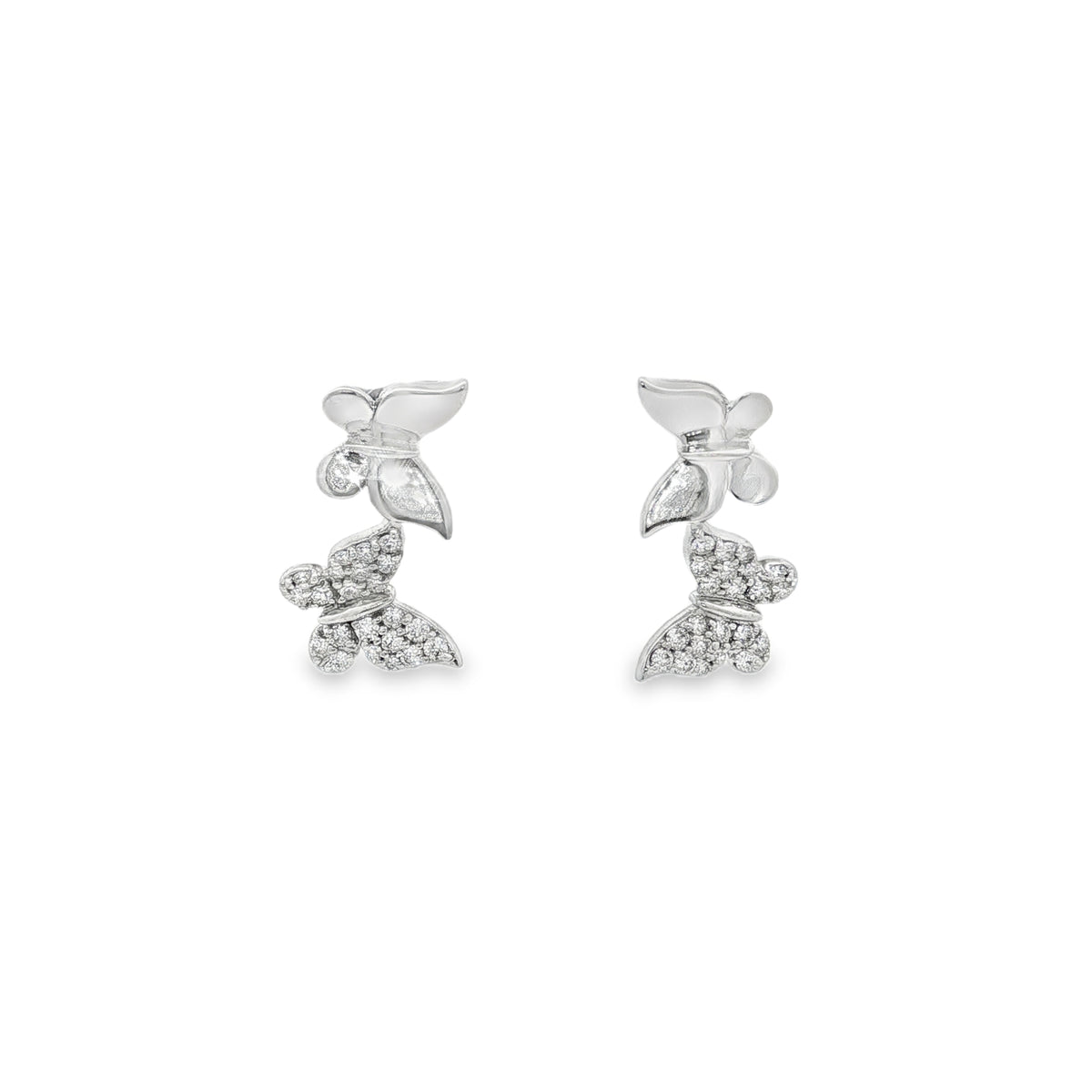 White gold butterfly earrings with polished wings and round diamonds