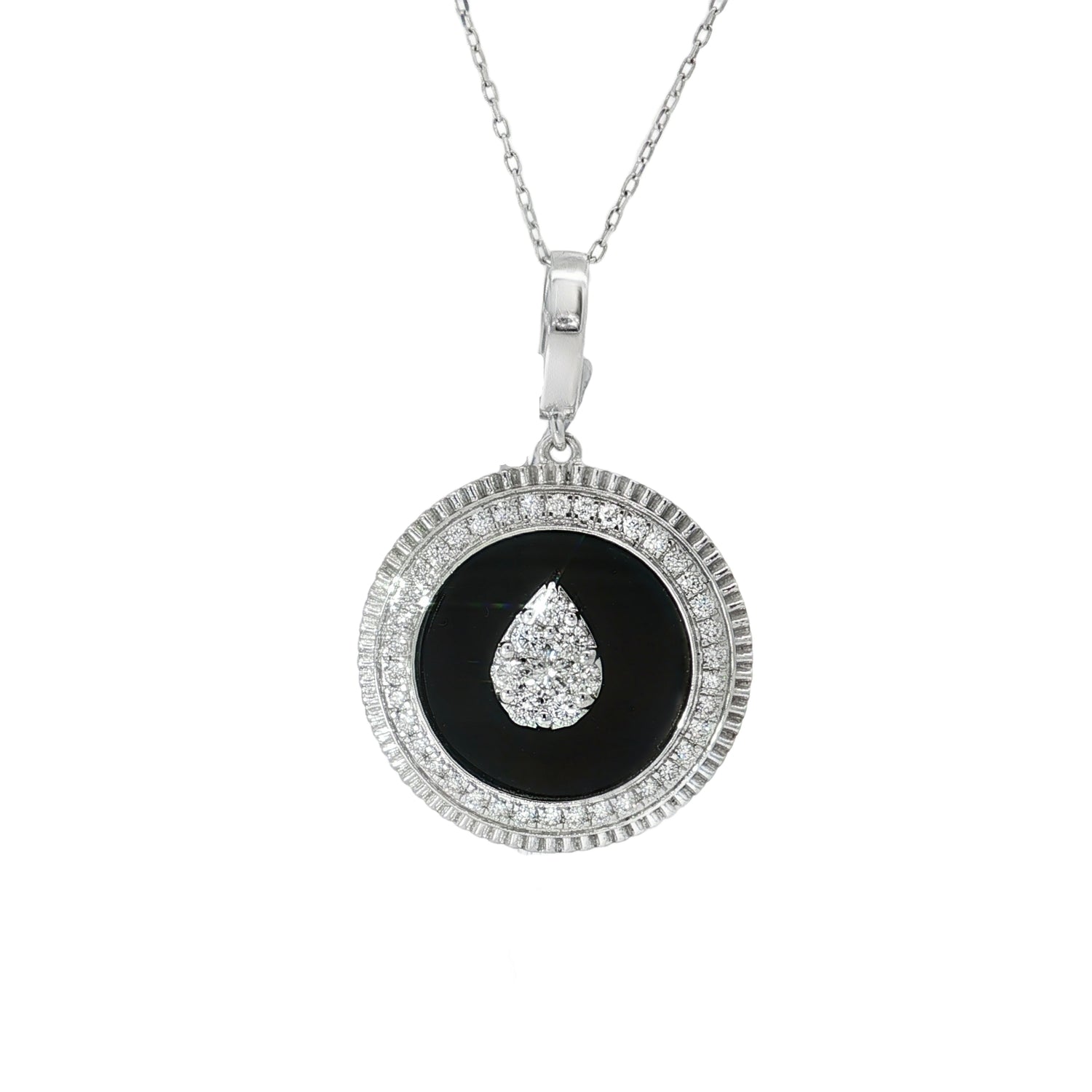 White gold medallion pendant with black onyx and pear diamond motif