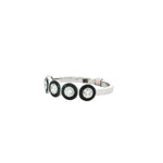 Angled view of repeating circular diamond motifs and polished band