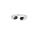 White gold bypass ring with teardrop emerald and sapphire ends and diamond accents