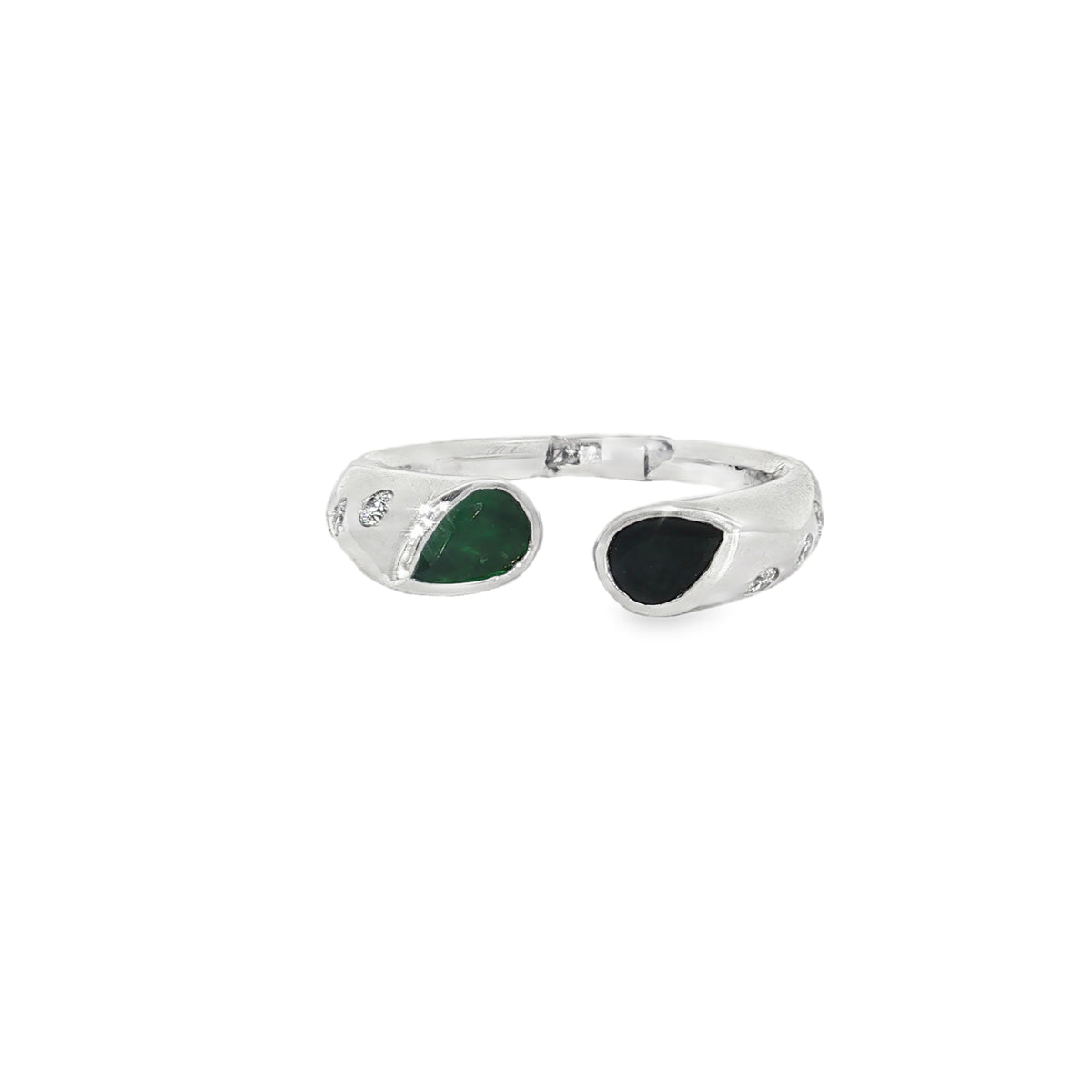 White gold bypass ring with teardrop emerald and sapphire ends and diamond accents