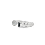 Angled view of sapphire medallion ring showing diamond accents along the broad shoulders