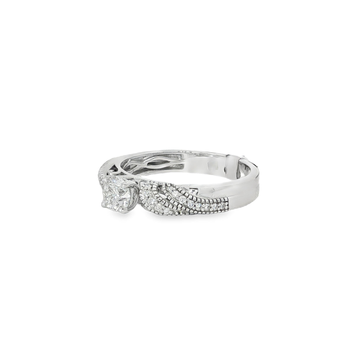 Angled view showing braided pavé bands and raised diamond cluster