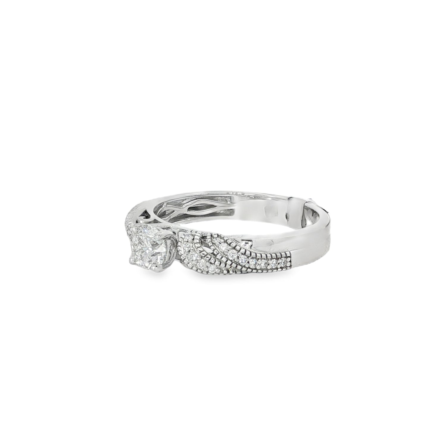 Angled view showing braided pavé bands and raised diamond cluster