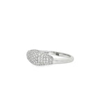 Angled view of pavé-set signet face and polished white gold band
