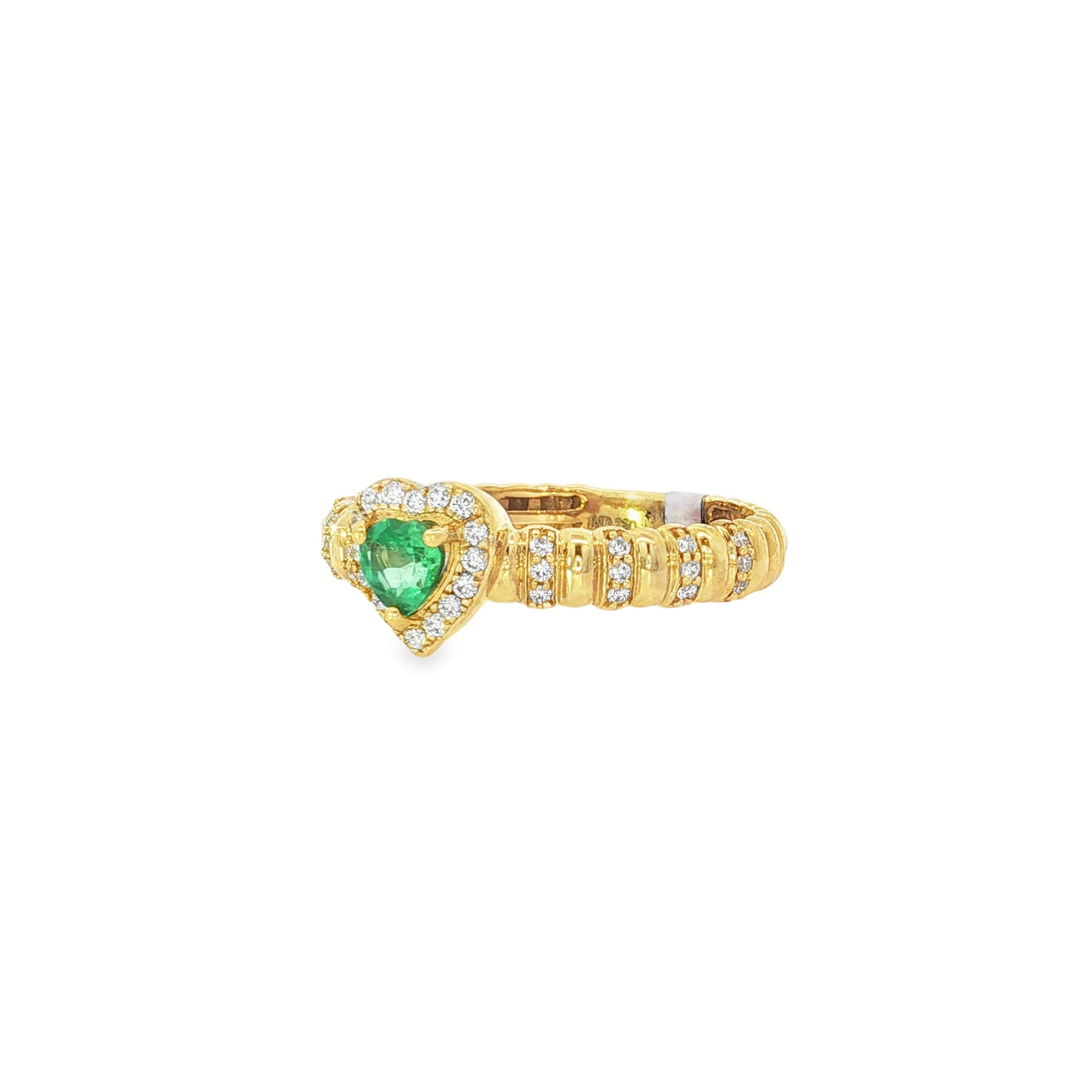 Angled view of emerald heart, diamond halo and detailed yellow gold band