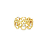 Angled view of interlocking yellow gold links and baguette diamonds