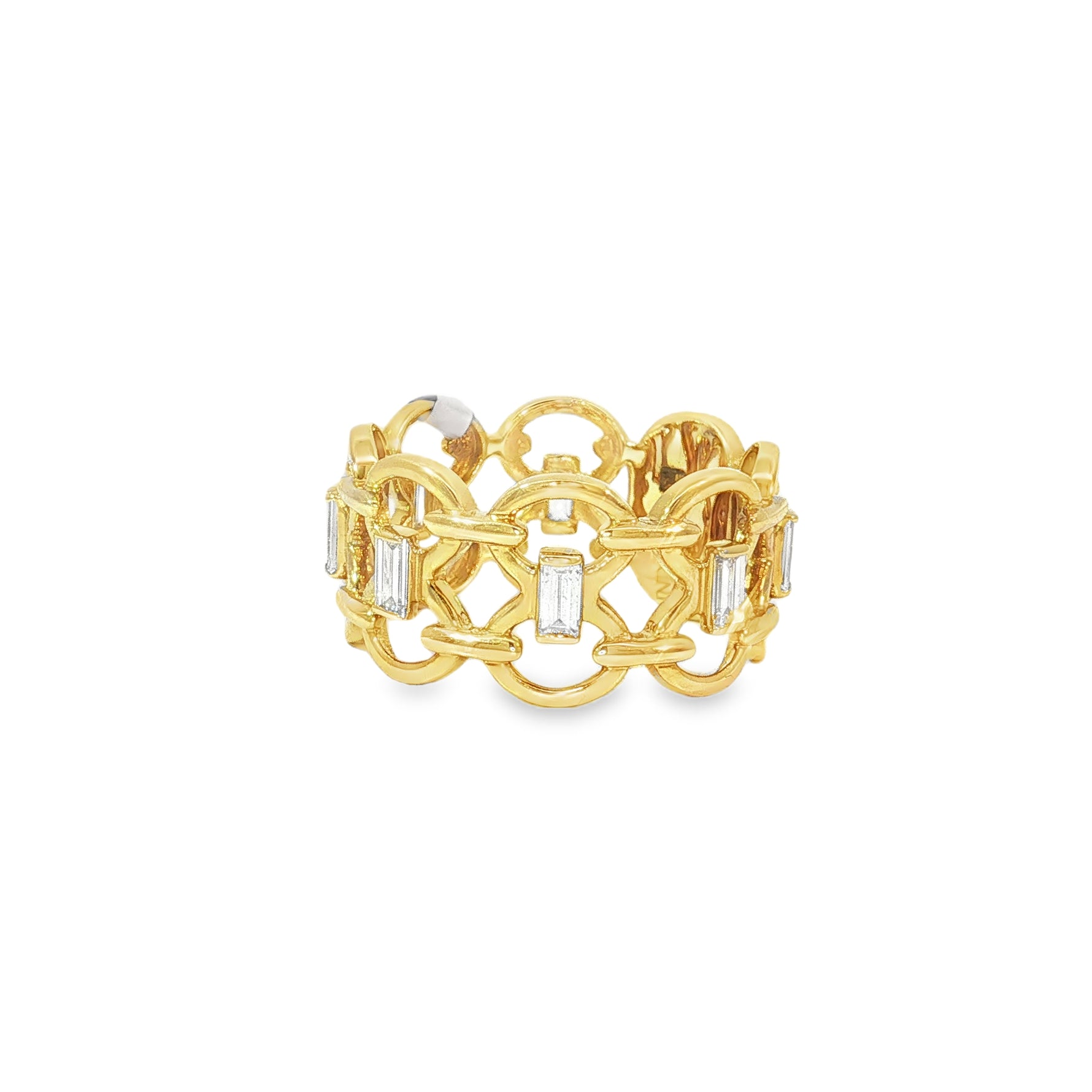 Angled view of interlocking yellow gold links and baguette diamonds