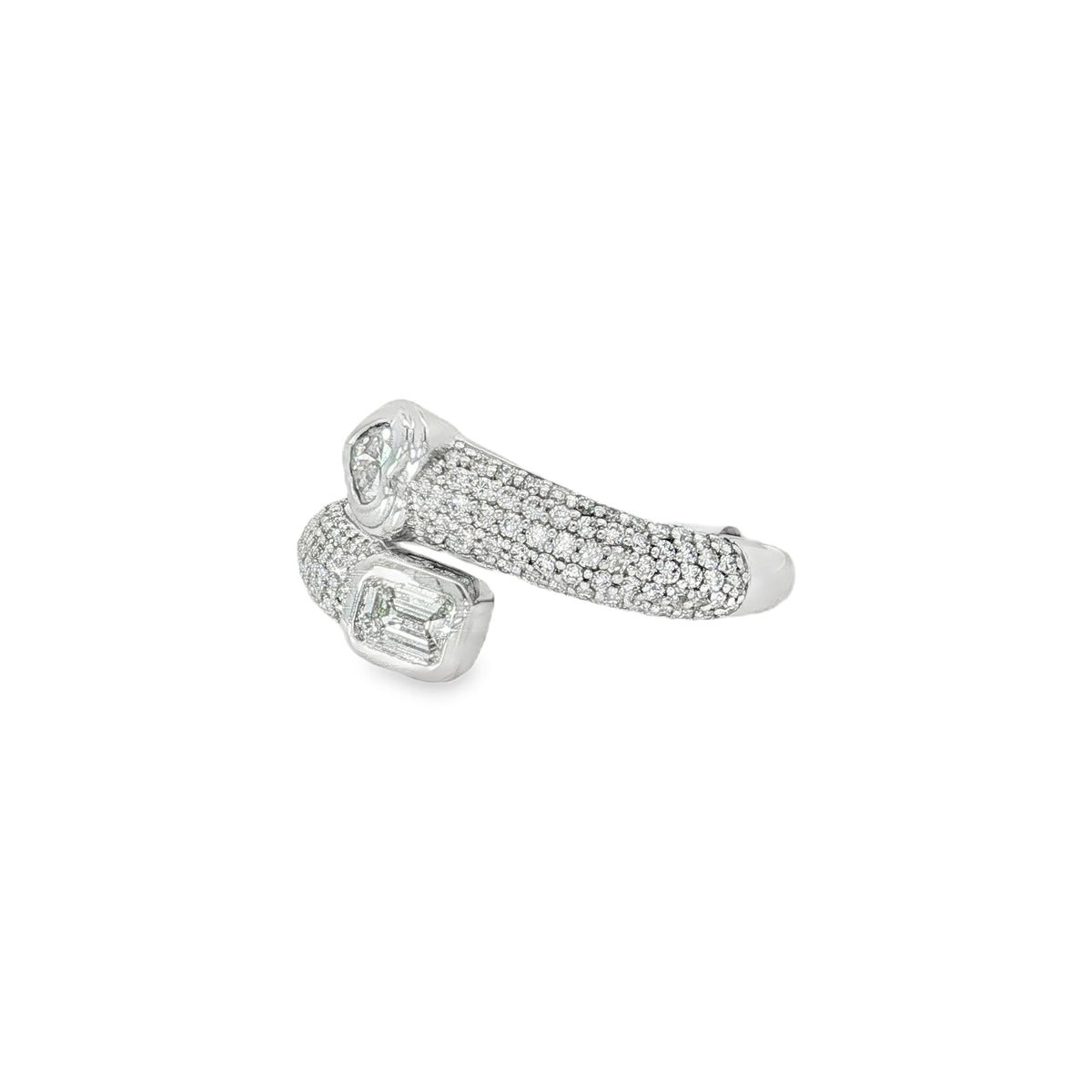 Angled view of pavé bands and opposing heart and emerald-cut diamonds