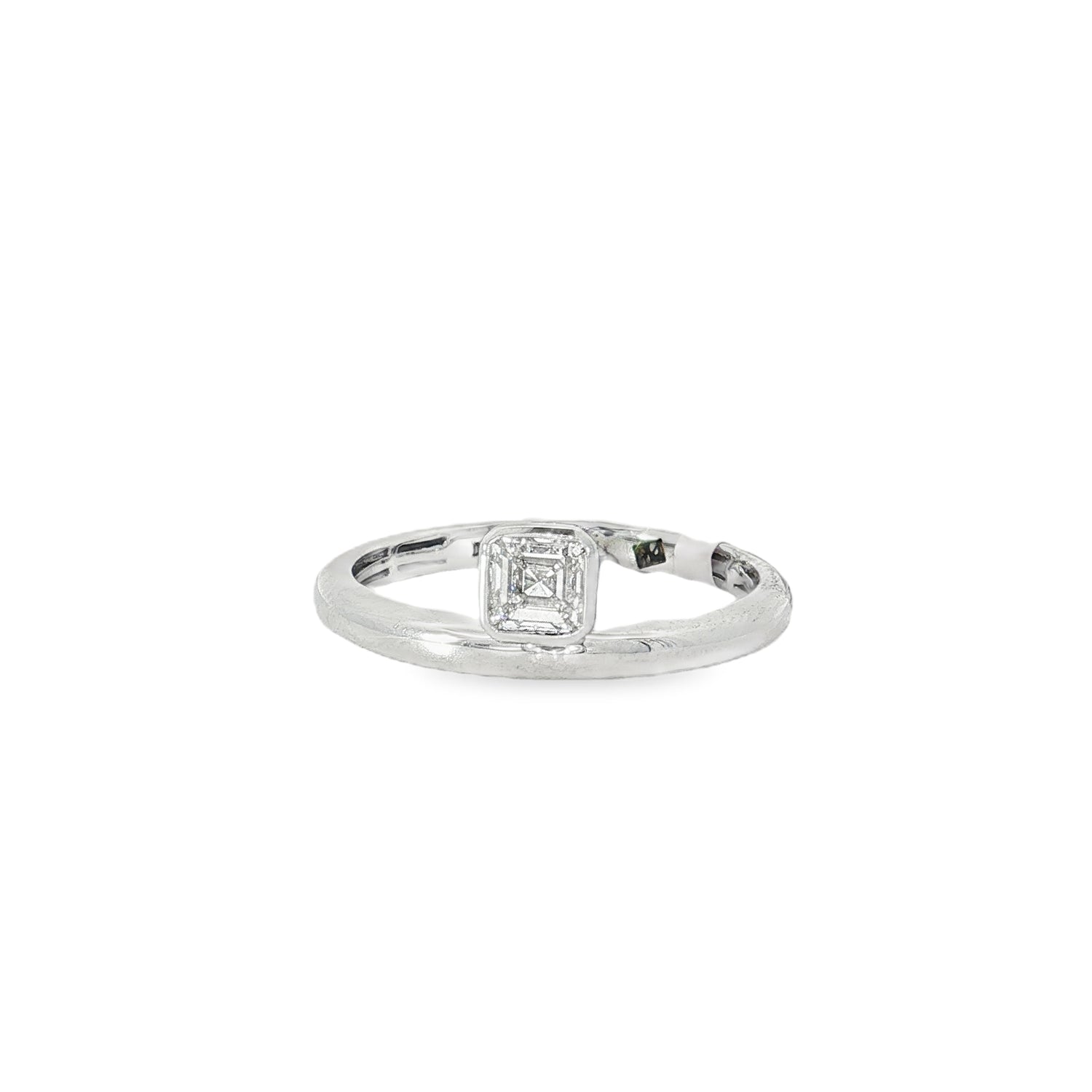White gold ring with compact square diamond cluster