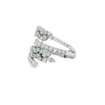 Angled view showing leaf clusters and sweeping pavé diamond bands
