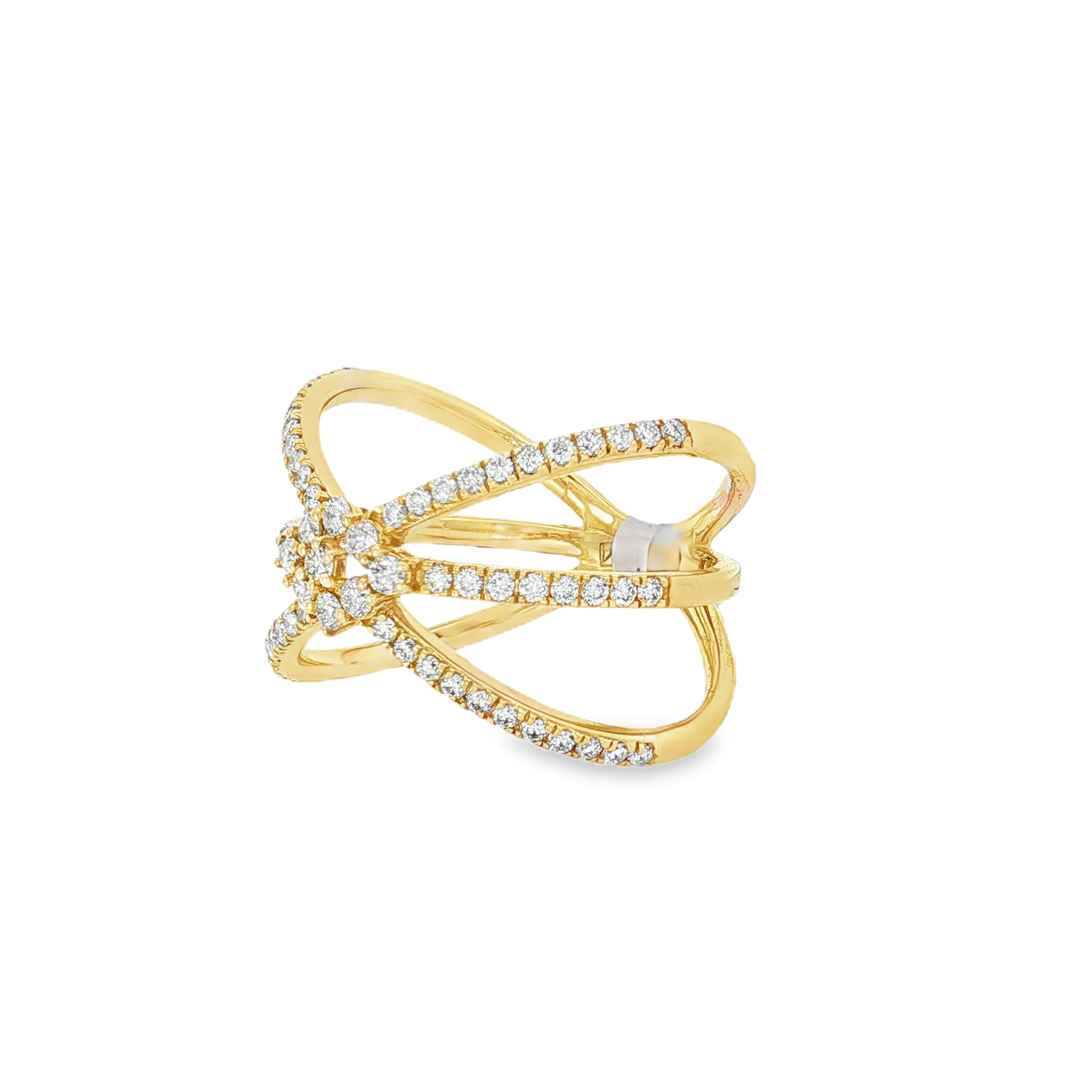 Angled view of sculptural yellow gold bands and central diamond starburst