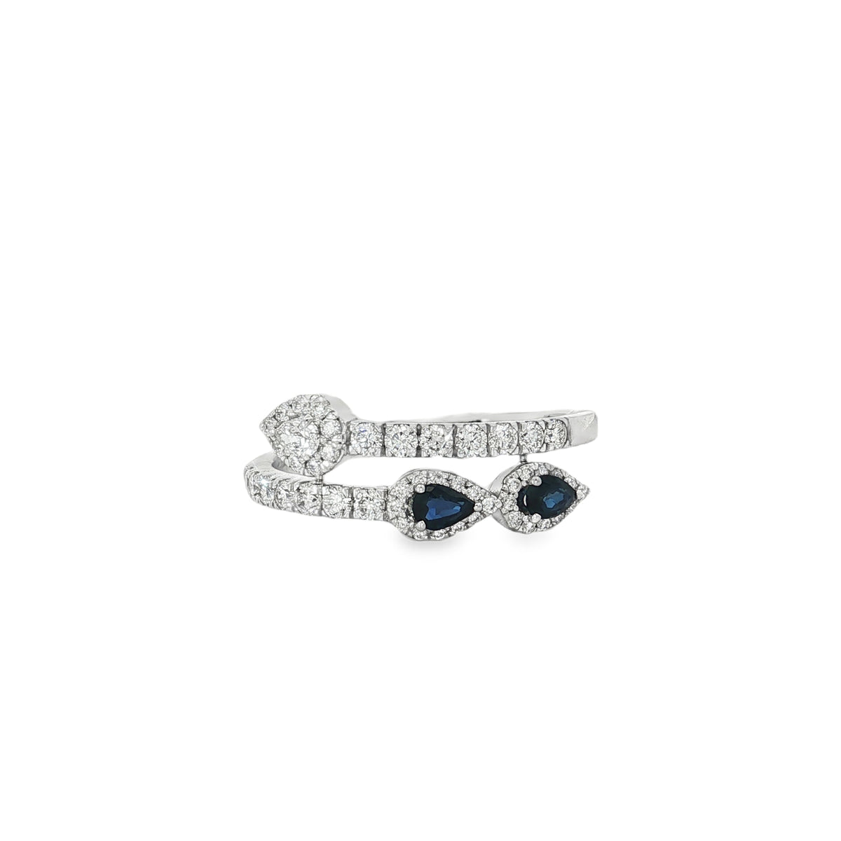 White gold bypass ring with pear sapphires and diamond halos