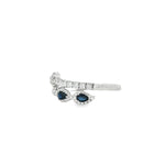 Side view showing pear sapphires, diamond halos and pavé crossover bands