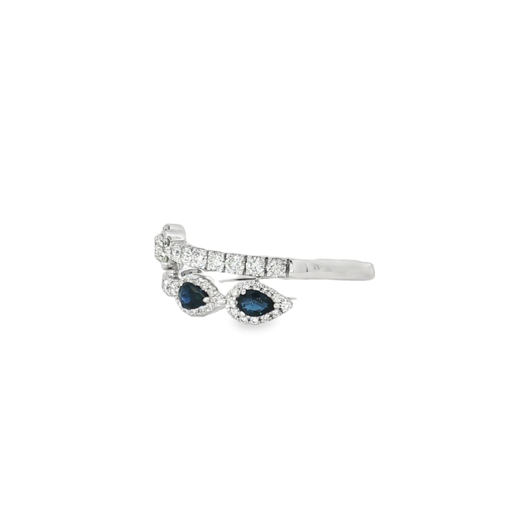 Side view showing pear sapphires, diamond halos and pavé crossover bands