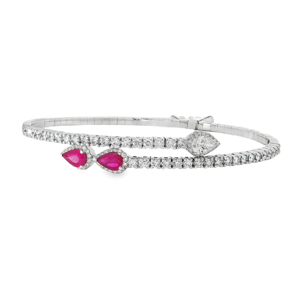 White gold wrap bangle with pear rubies and round diamond rows