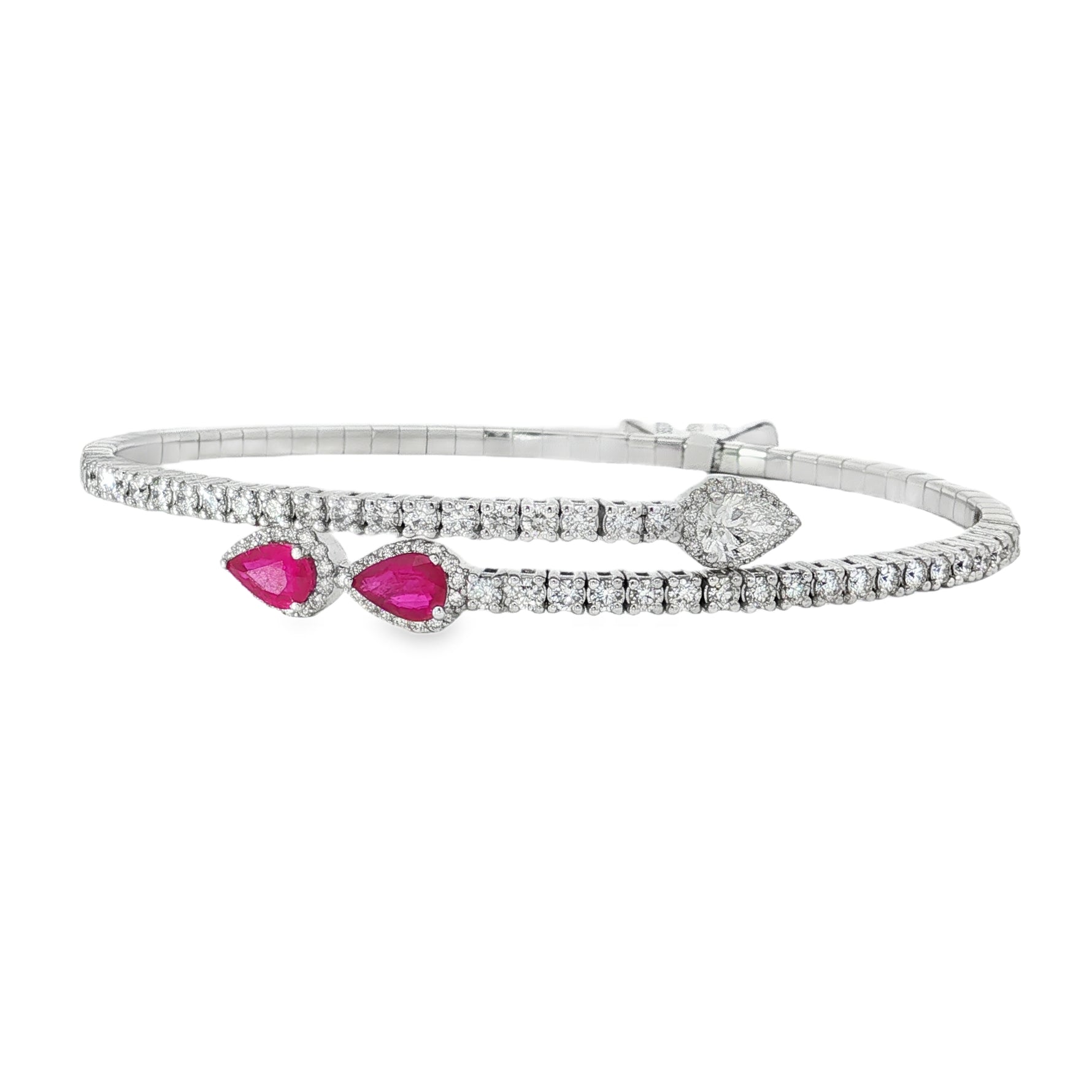 White gold wrap bangle with pear rubies and round diamond rows