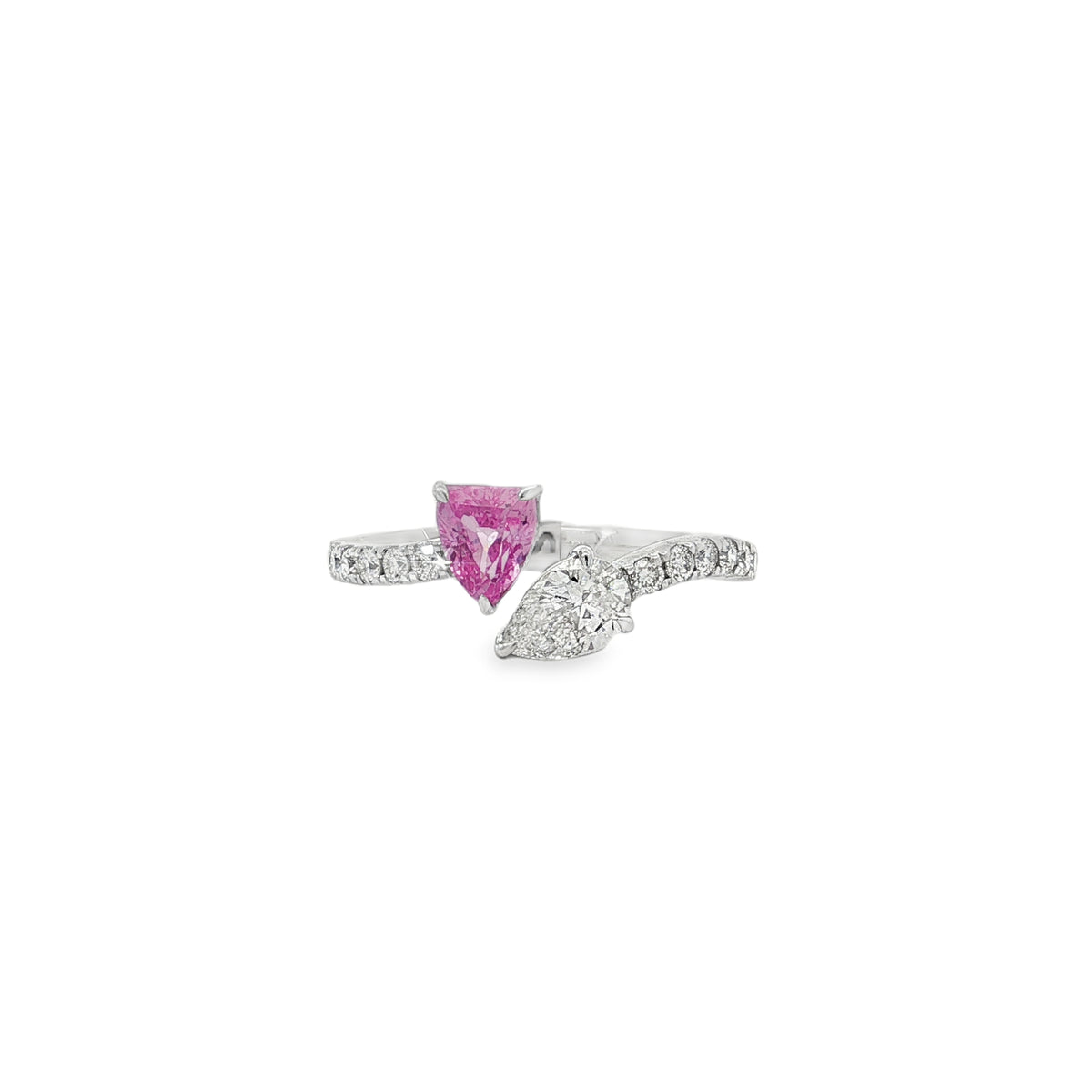 White gold open ring with pink sapphire, pear diamond and diamond-set band