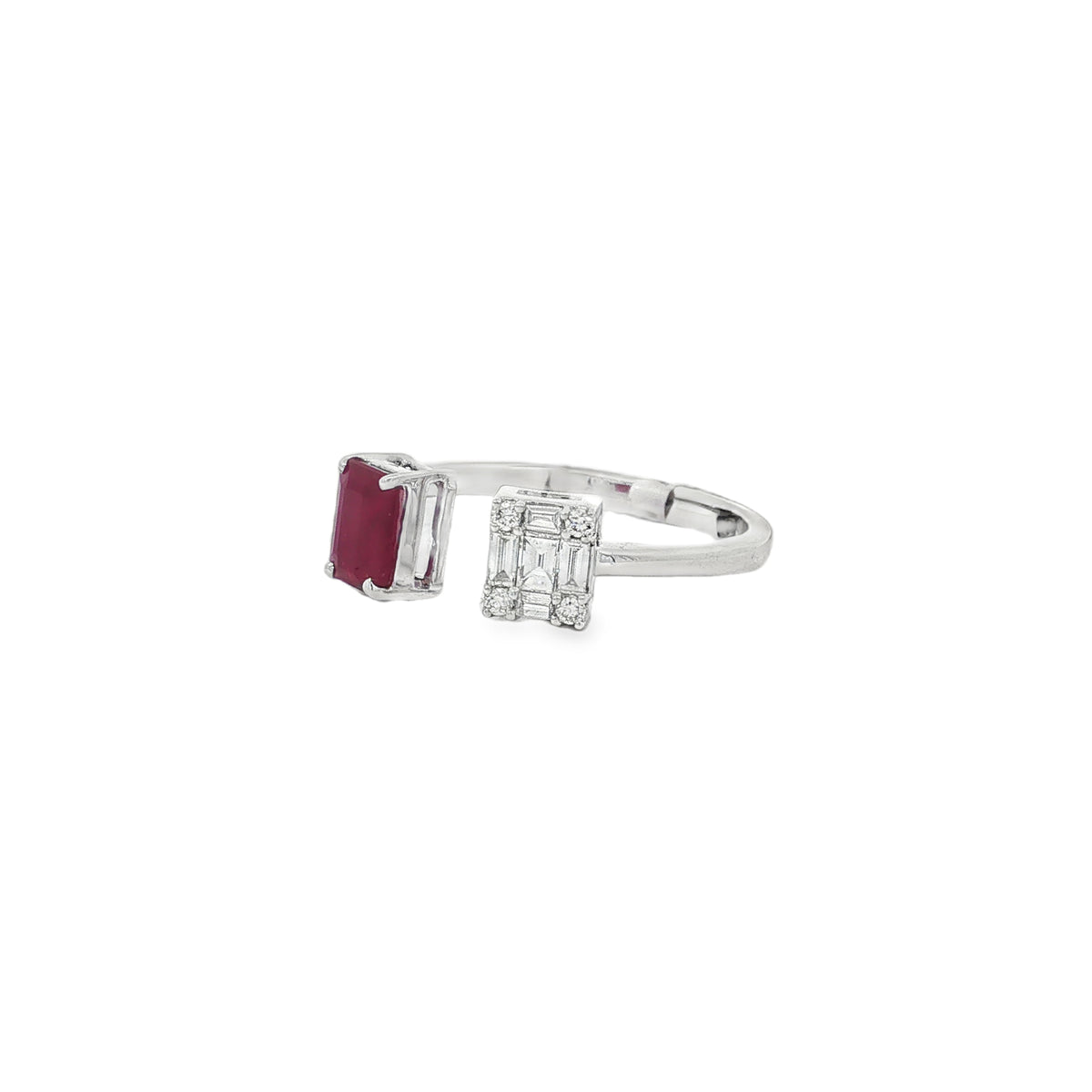 Angled view of ruby and baguette diamond duo ring showing the open band