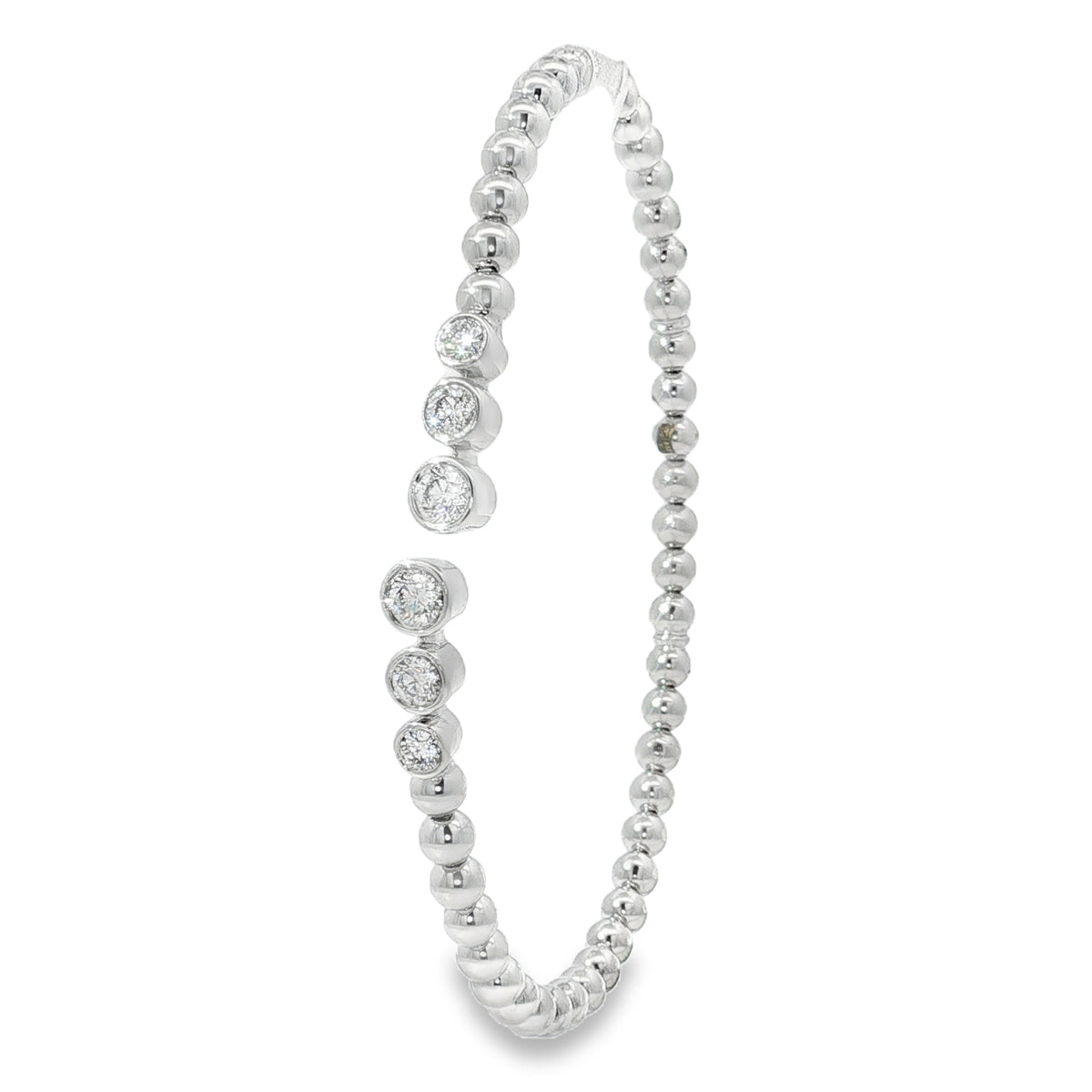 Side view of white gold beaded bangle showing separated diamond-set ends