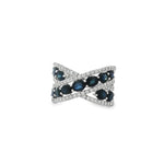 White gold crisscross ring with rows of oval sapphires between diamond borders