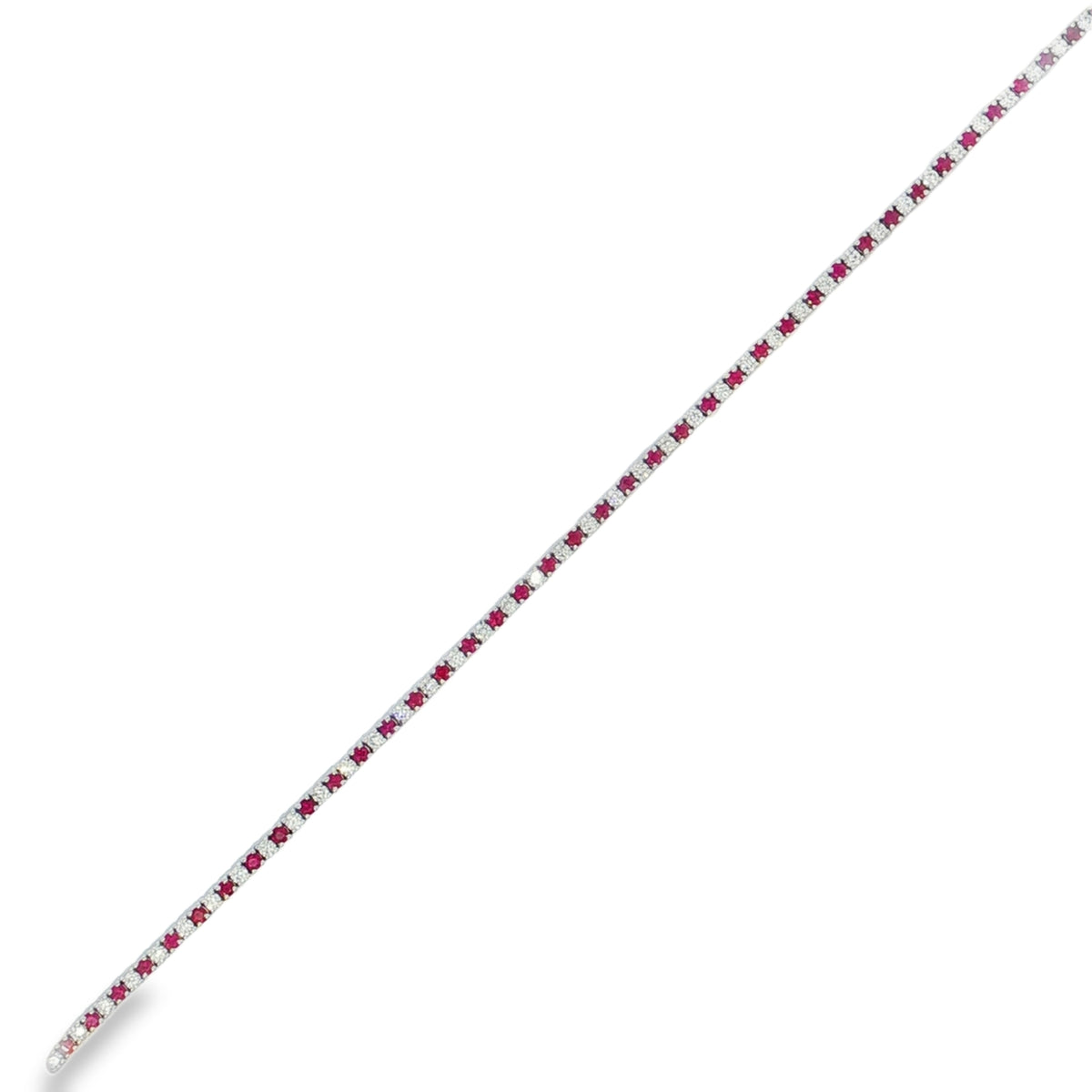 White gold tennis bracelet with alternating red rubies and round diamonds