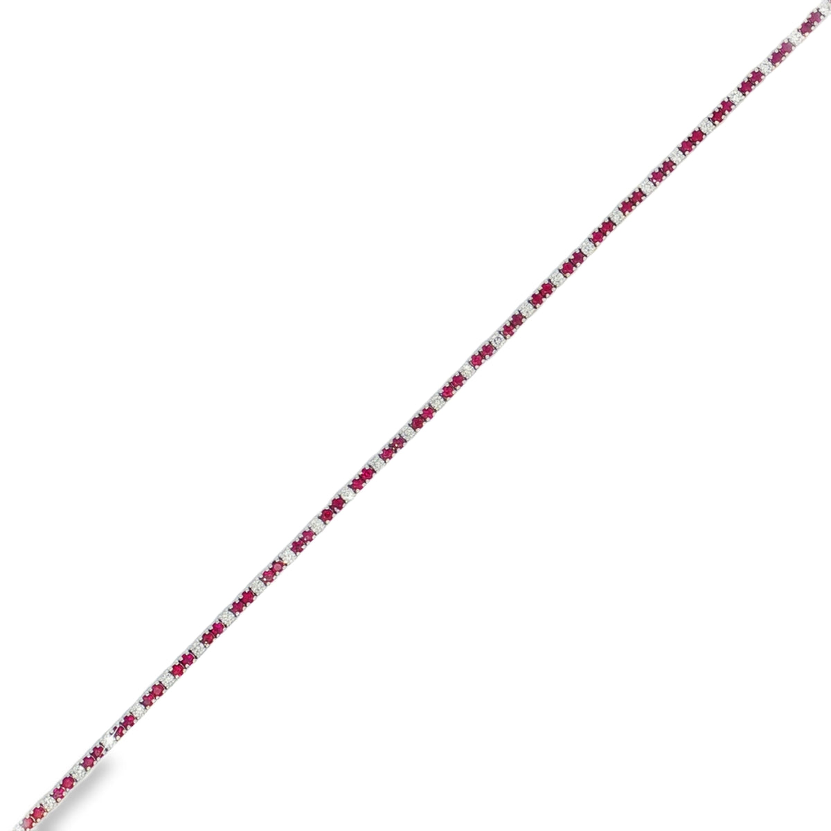 White gold tennis bracelet with ruby segments separated by round diamond accents