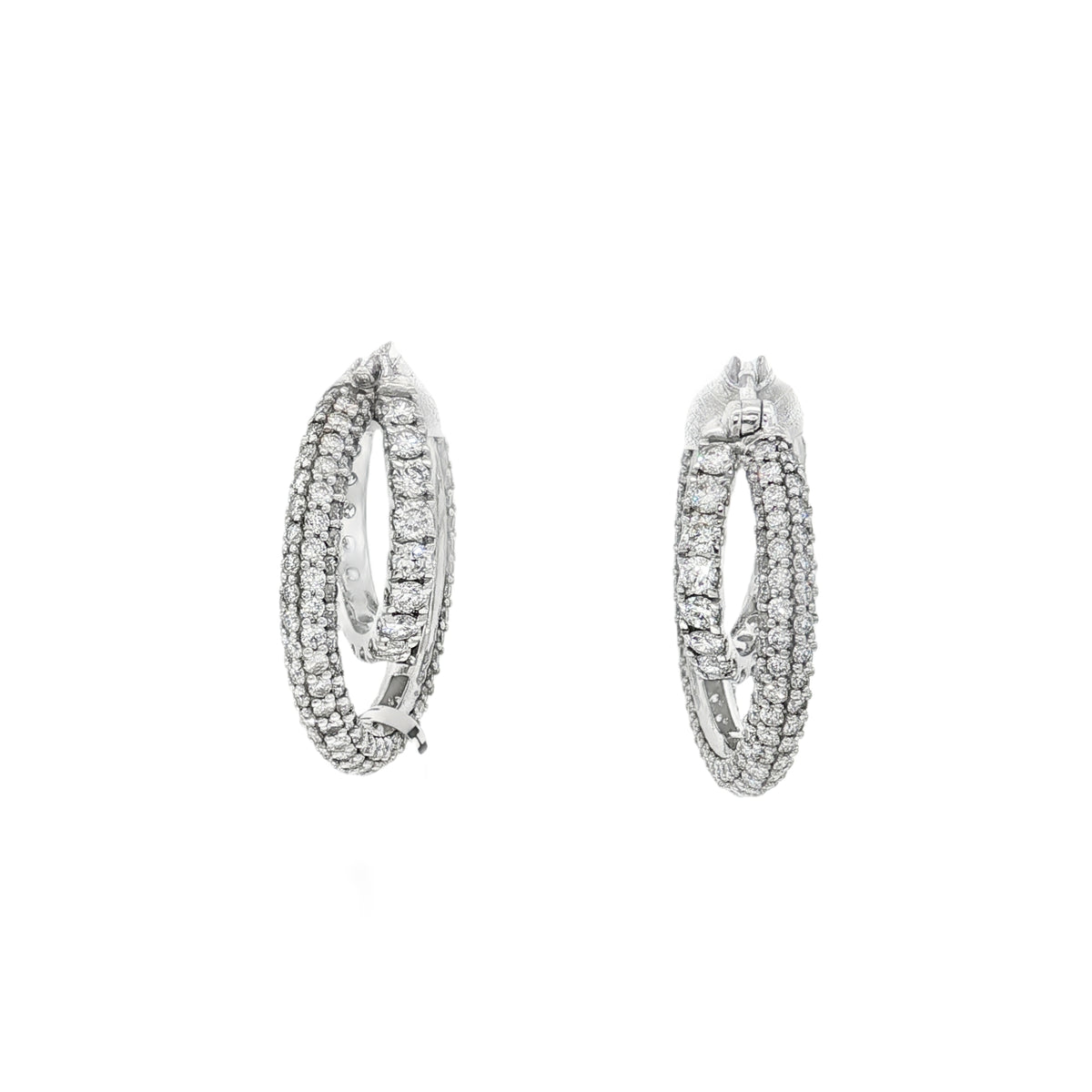 White gold hoop earrings with multiple diamond rows and diamond-set inner rear curves