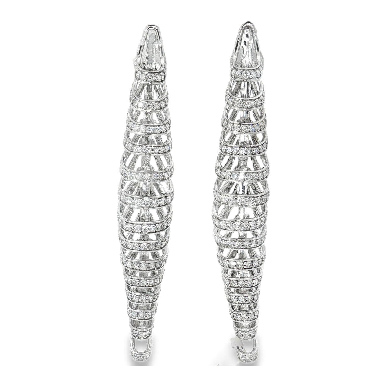 White gold tapered diamond earrings with repeated horizontal bands and open geometric details
