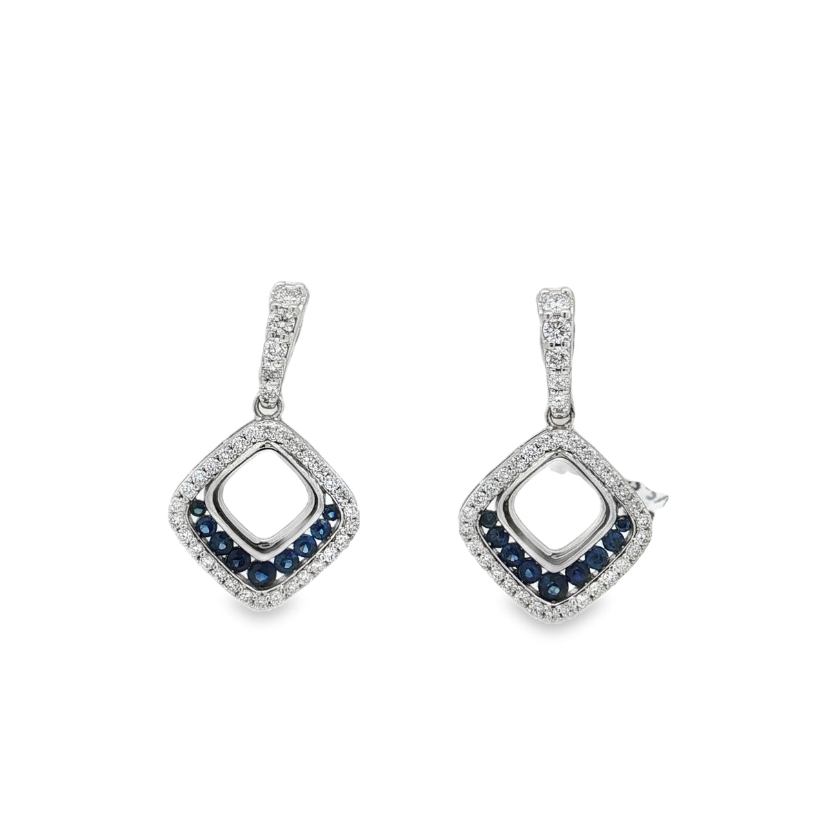 White gold drop earrings with sapphire accents inside open diamond-shaped diamond frames