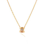 Yellow gold pendant with central pear diamond and rounded sculptural metal details