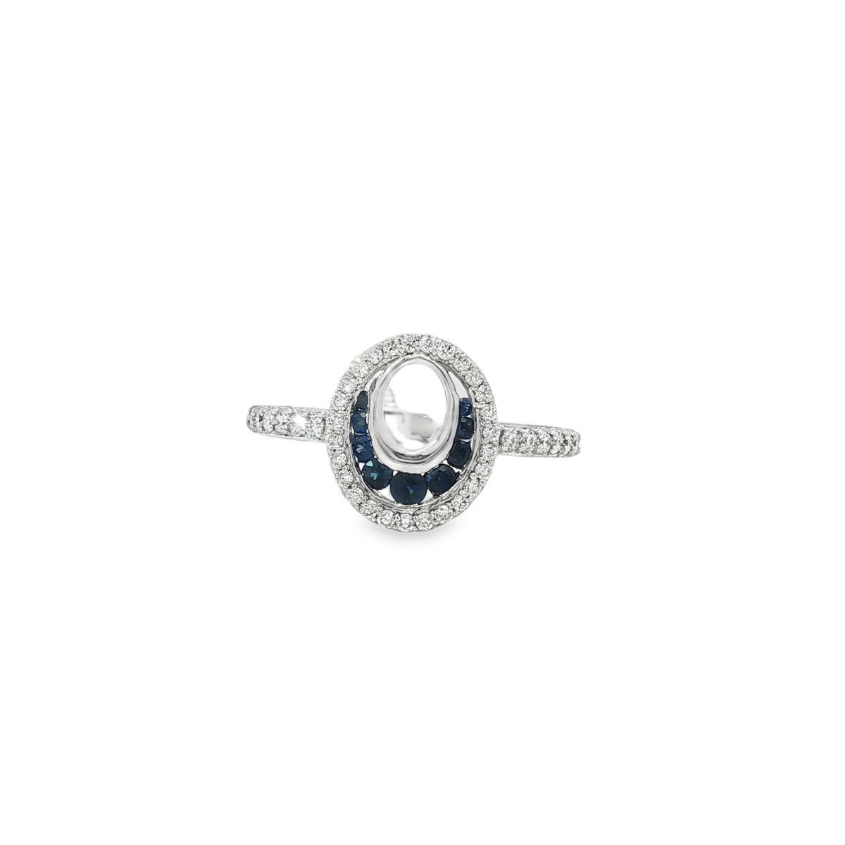 White gold open-oval ring with sapphire crescent inside a diamond border