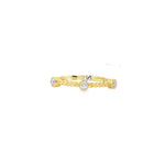 Yellow gold rope-twist ring with spaced round diamonds in smooth bezel settings